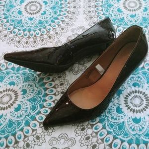 Tortoise pumps. Like new. No scuffs. Show stopper